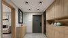 Modern minimalist hallway entrance with light wood cabinets, gray walls, recessed ceiling lights, and a sleek dark entry door.